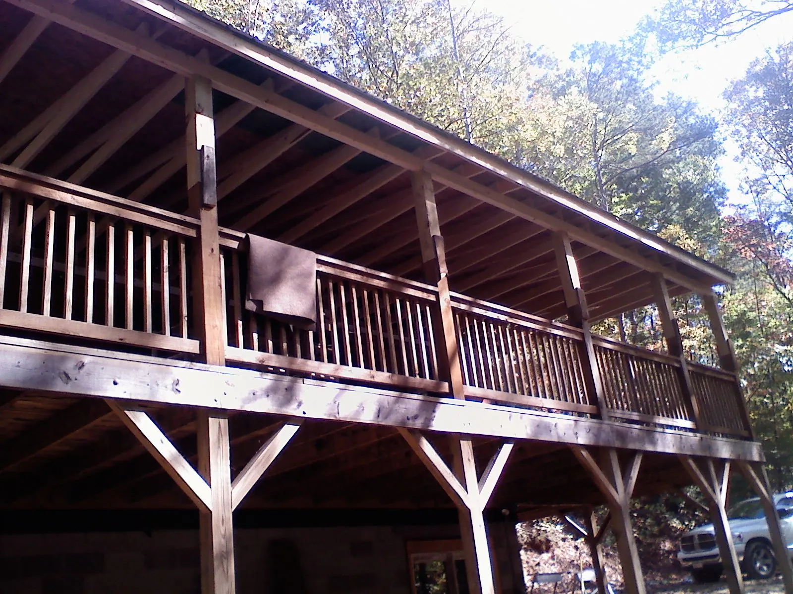 Timber framing under a new elevated porch and deck — Roof Leak Repair in Woodhull by Roofing Brothers